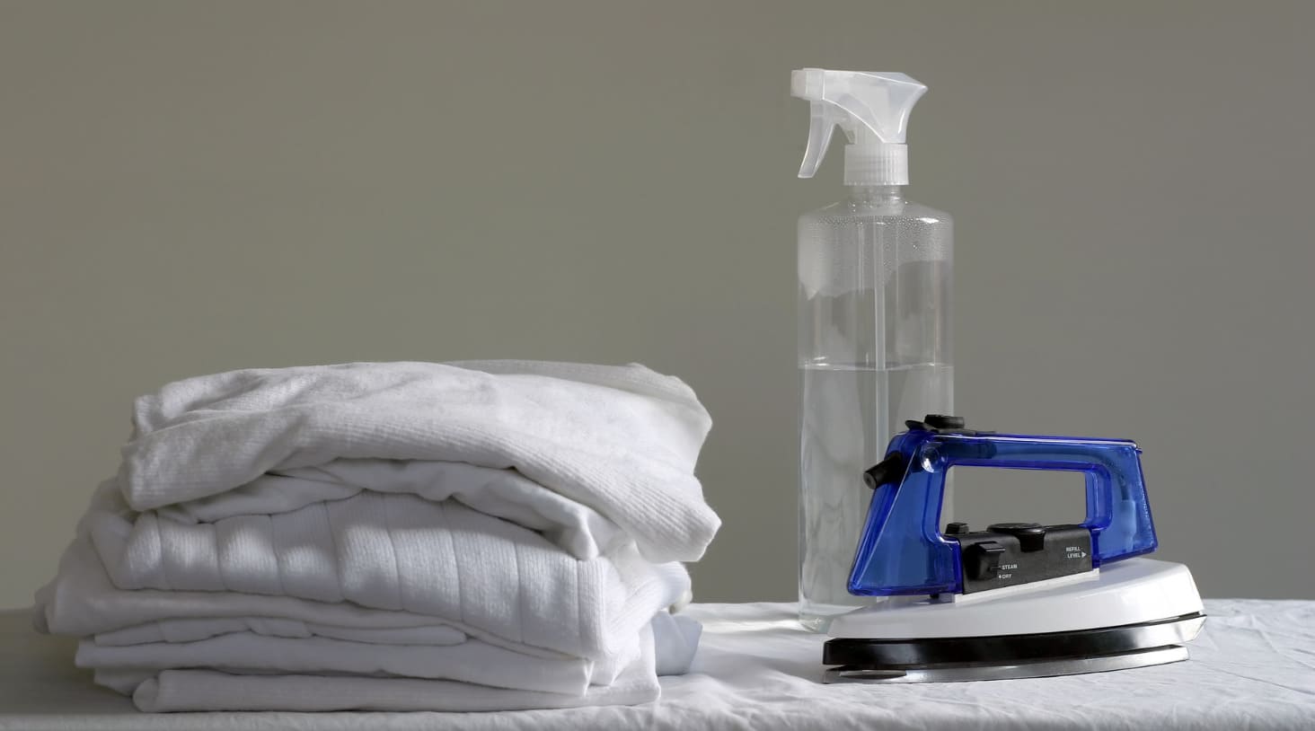 How to Use a Hair Dryer, a Steam Iron and a Spray Bottle to Remove Wrinkles from Your Clothes